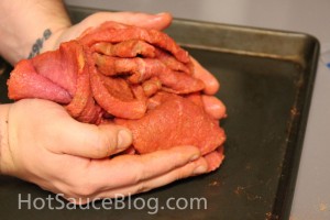 Mix meat together with your hands to coat