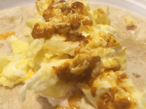 Hot Rooster Sauce on Breakfast Taco